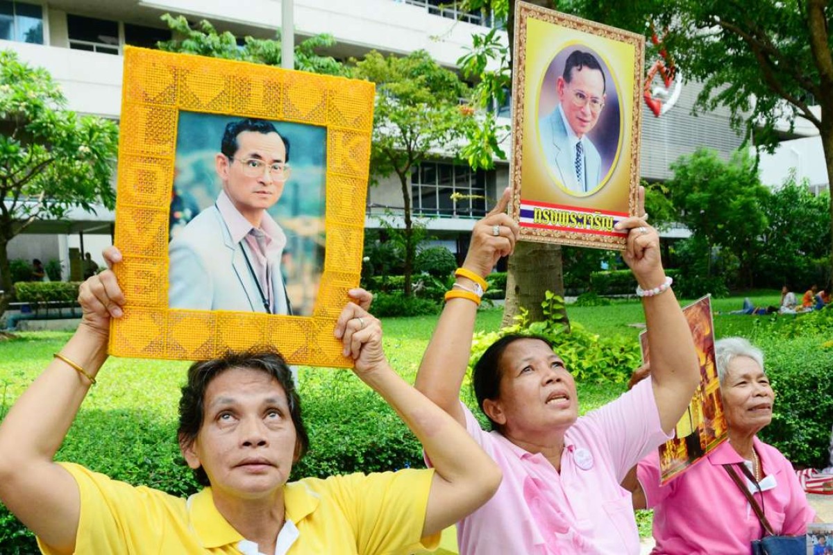 Thai people mourn the death of their king Thai people mourn the death of their king